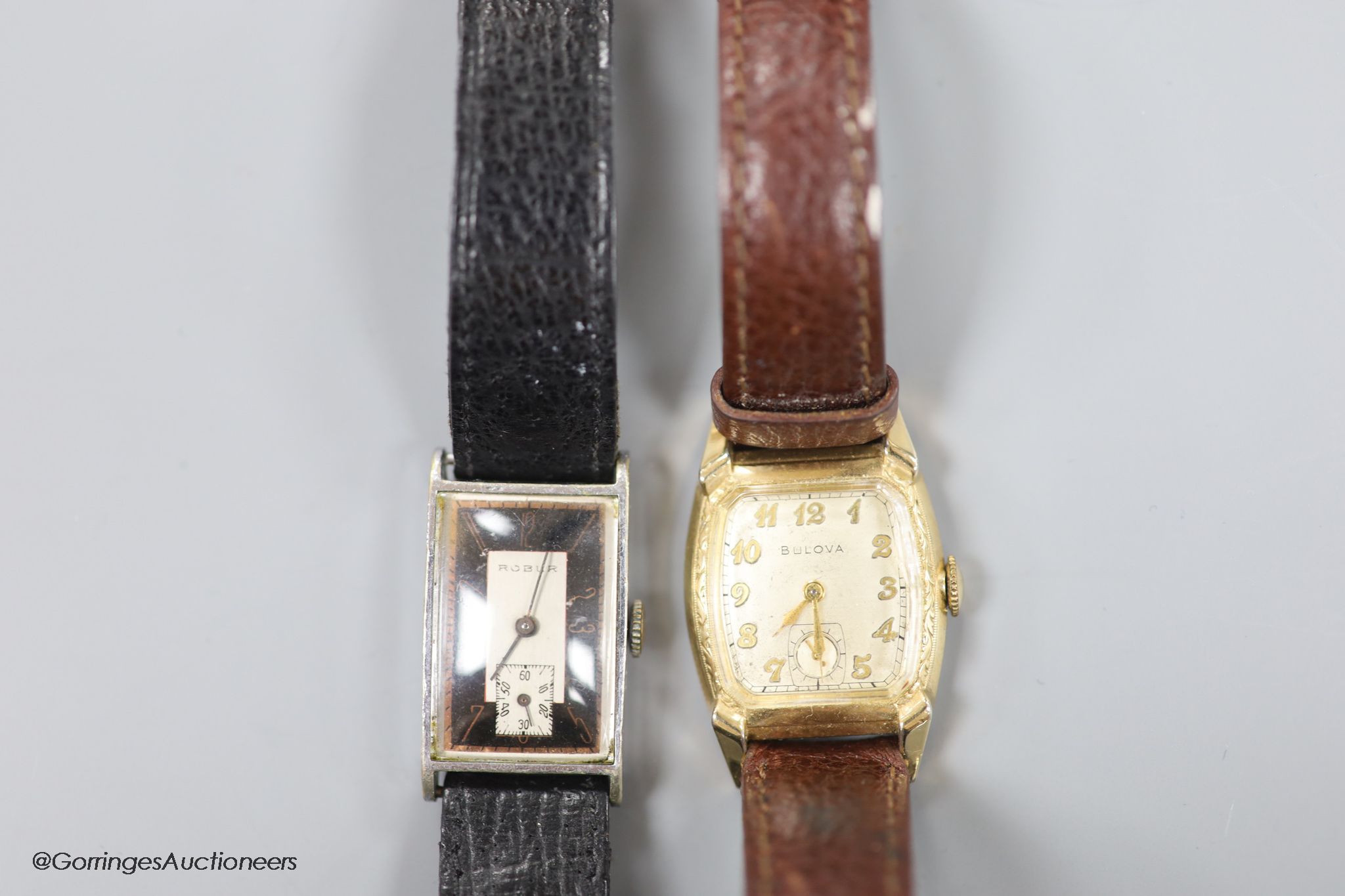 Two gentleman's mid 20th century manual wind wrist watches- gold plated and steel manual wind Bulova and a stainless steel Robur rectangular dial manual wind wrist watch.